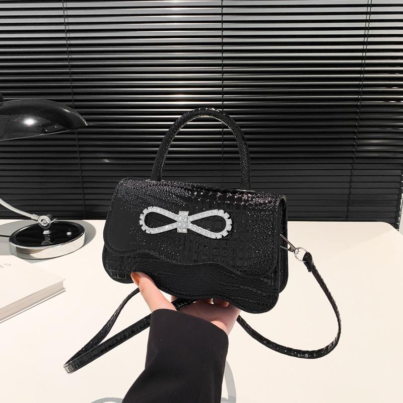 Portable casual simple personalized bow women's bag new fashion shoulder messenger small square bag