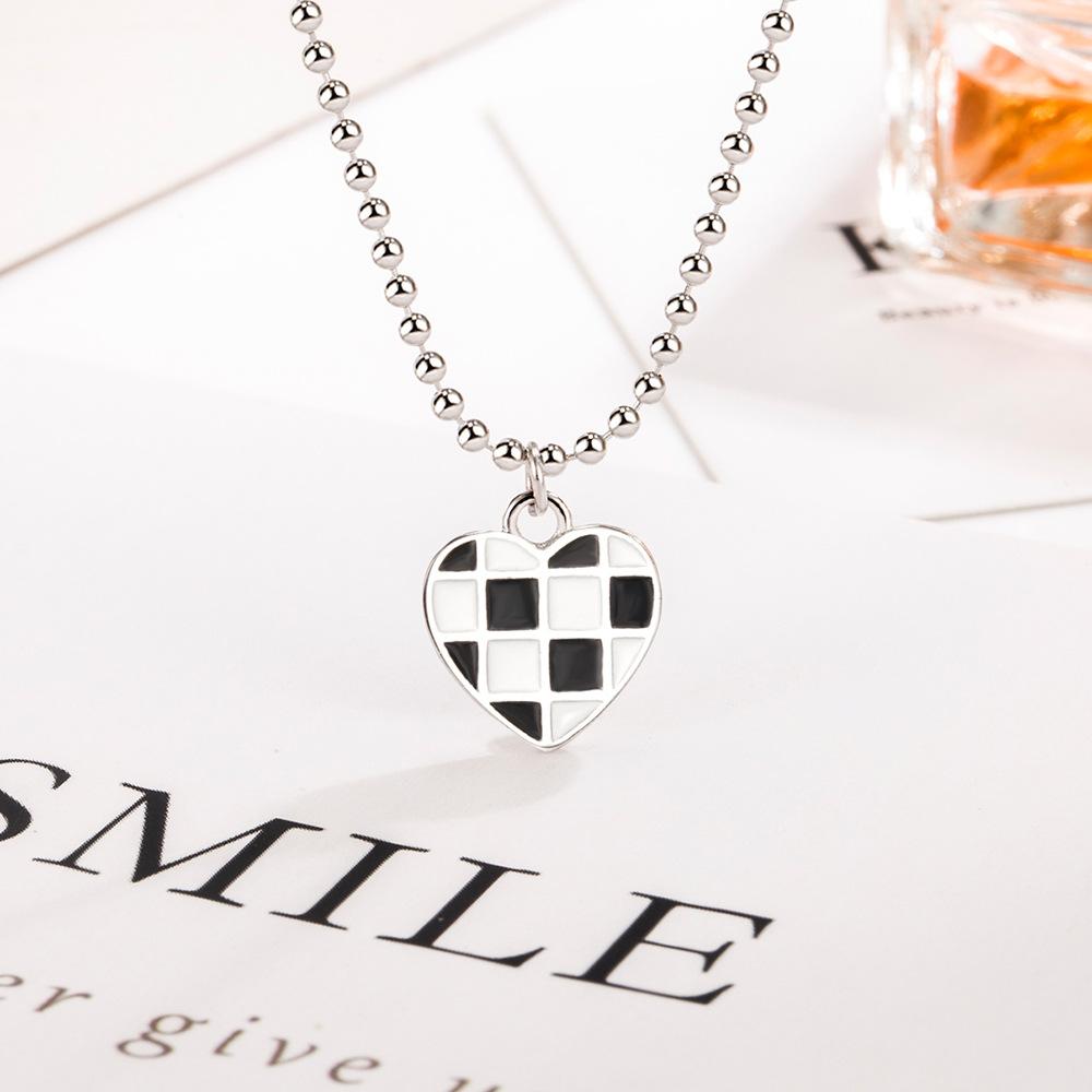 Elegant Retro Black And White Checkerboard Love Pendant Necklace Female Versatile Cold Wind Design High-End Necklace Jewelry