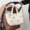 Reisetasche Wickeltasche für Frauen Große Kapazität Stickmuster Handtasche Kinderwagen Hängende Tasche Mama-Tasche