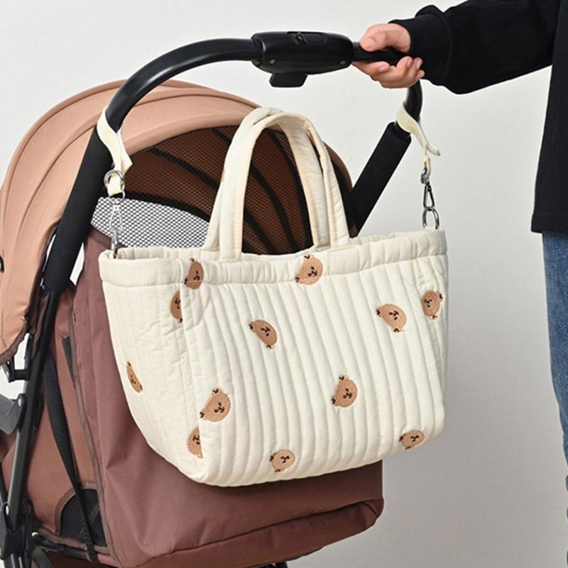 Reisetasche Wickeltasche für Frauen Große Kapazität Stickmuster Handtasche Kinderwagen Hängende Tasche Mama-Tasche