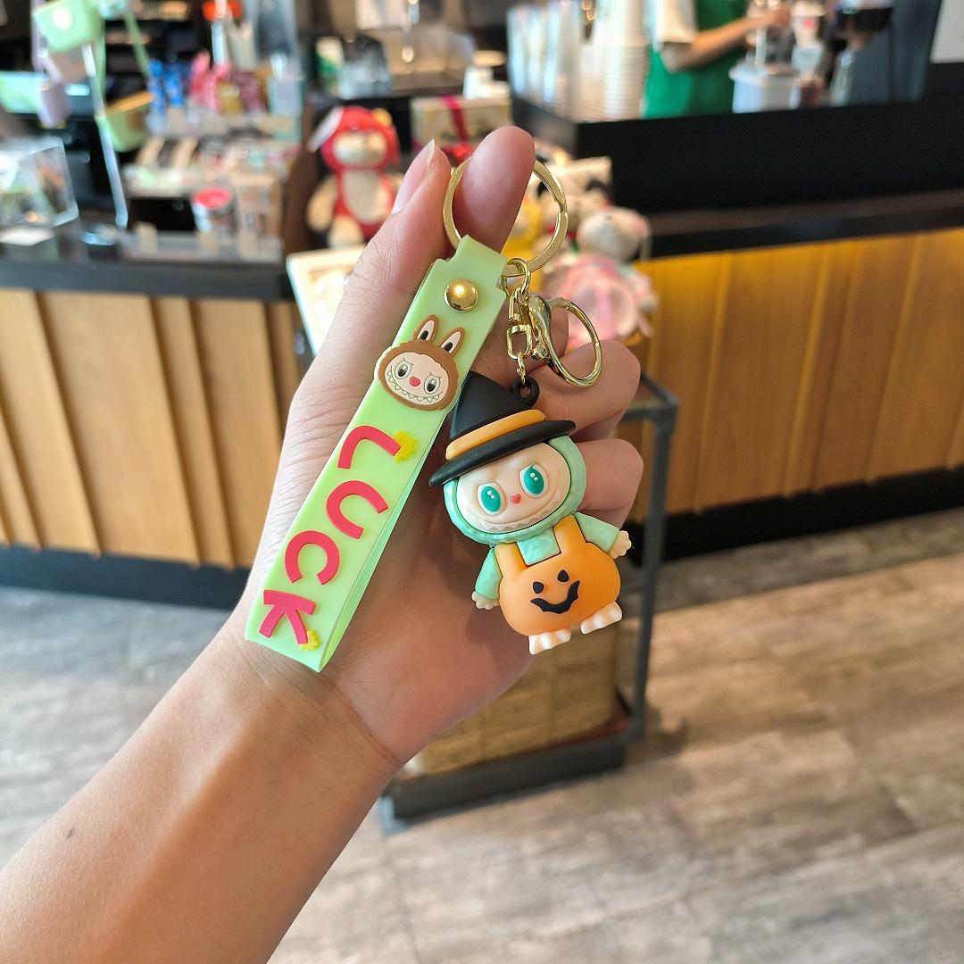 

Tide Play Cross-dressing Keychain Cute Couple Schoolbag Pendant Catch Doll Locomotive Key Chain