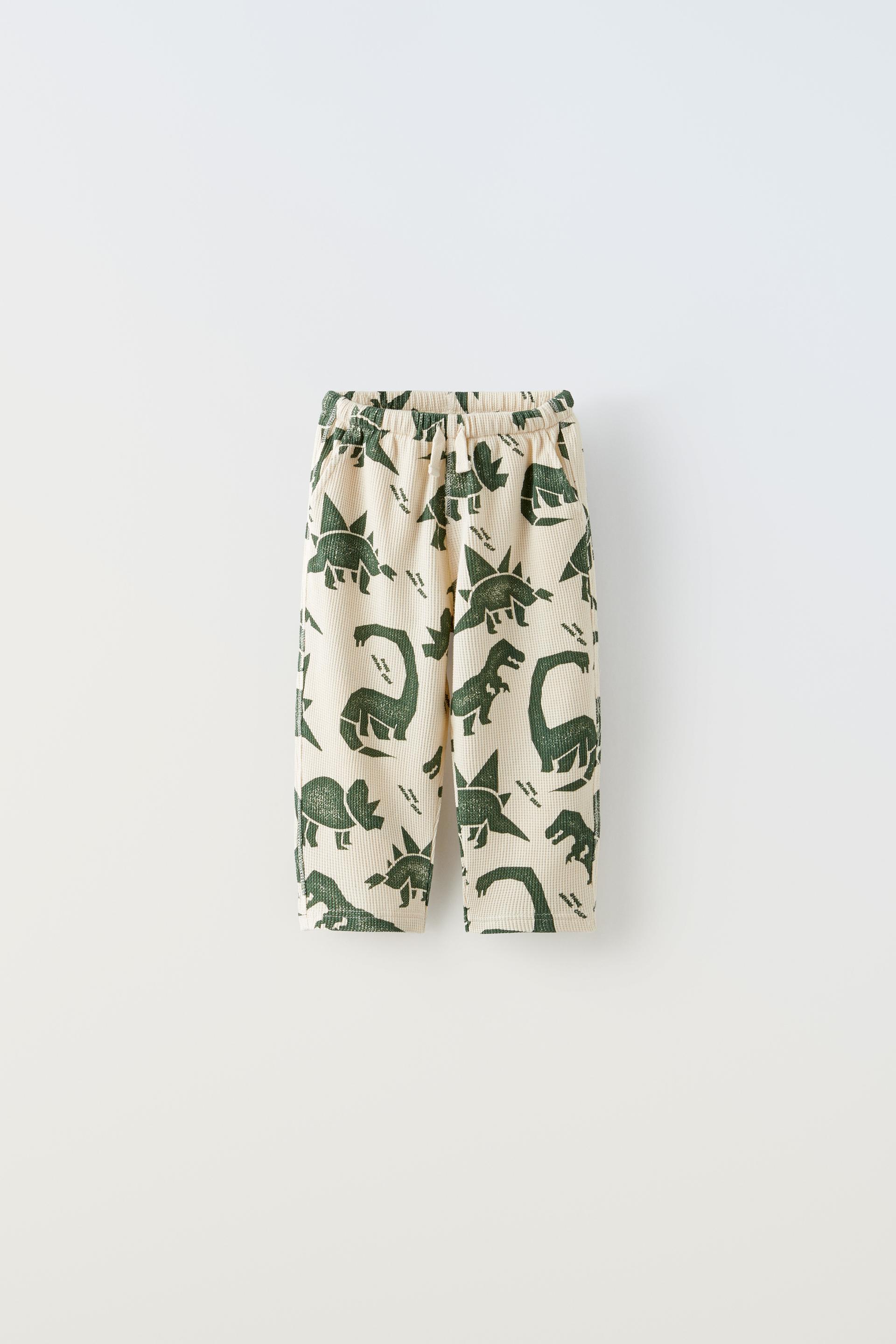 

БРЮКИ С ТЕКСТУРИРОВАННОЙ ДИНОЗАВРОЙ