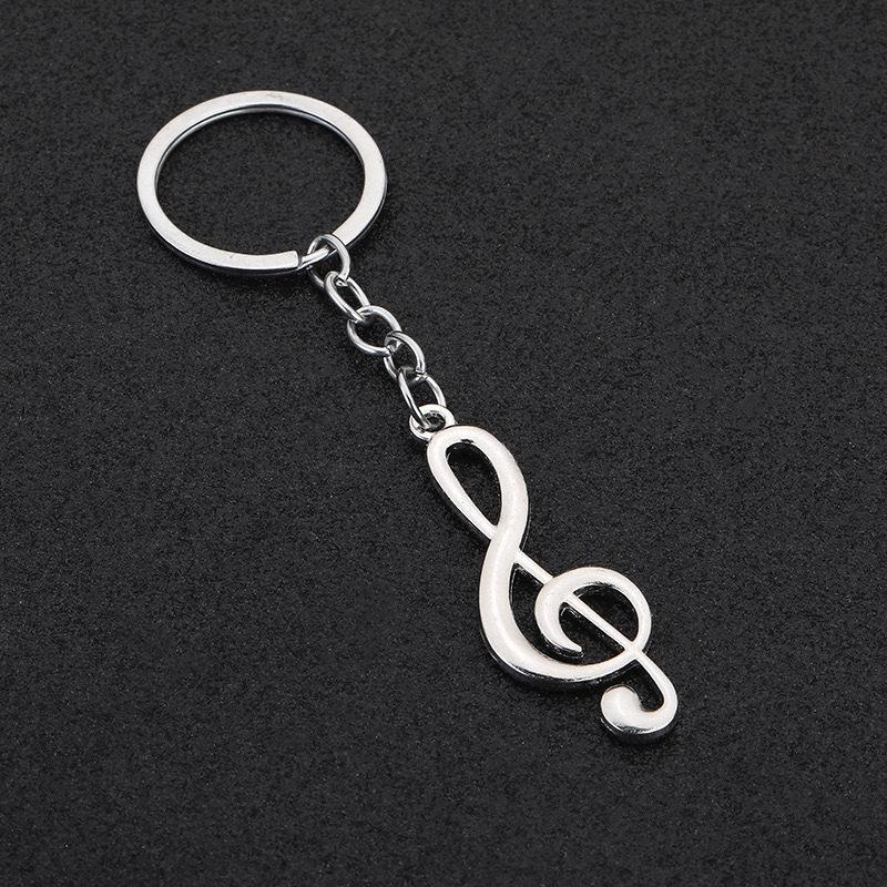 Alloy Maple Leaf Keychain with Violin and Guitar Pendant – Musical Instrument Charm