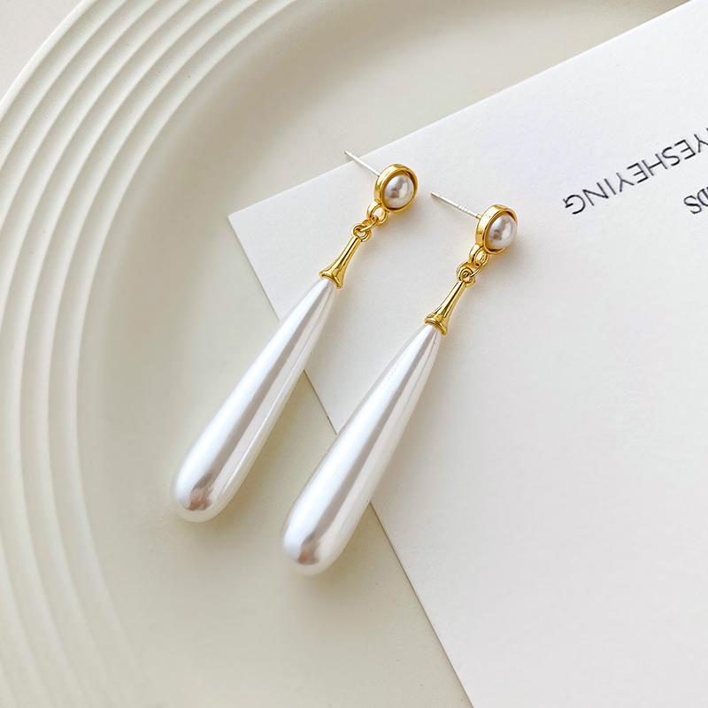 

Новые длинные висячие серьги для женщин Имитация циркона Подвески в виде капель воды Преувеличенные серьги-подвески Элегантные свадебные серьги с цирконом