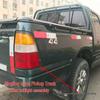 Isuzu Qingling Pickup Truck Rear Tail Light Assembly for 1998 Model - Includes Reverse and Brake Light Bulb.