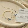 Artistic Small Blue & White Ceramic Bird Pendant Bracelet with Adjustable Woven Cord - Fresh Forest Style for Women