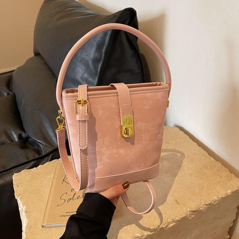

Bags Korean high-end versatile bucket bags autumn and winter niche design 2024 new messenger bags women s handbags рожевий