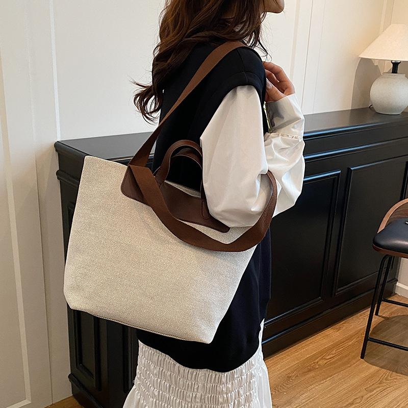 Wholesale Japanese minimalist style portable tote bag women's bag 2025 summer new contrasting color shoulder bag large capacity underarm bag