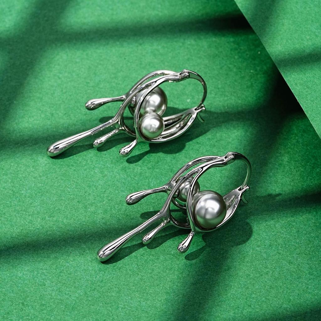 Elegant Pearl Drop Earrings: Irregular Metal 'Lava' Design with European & American Style