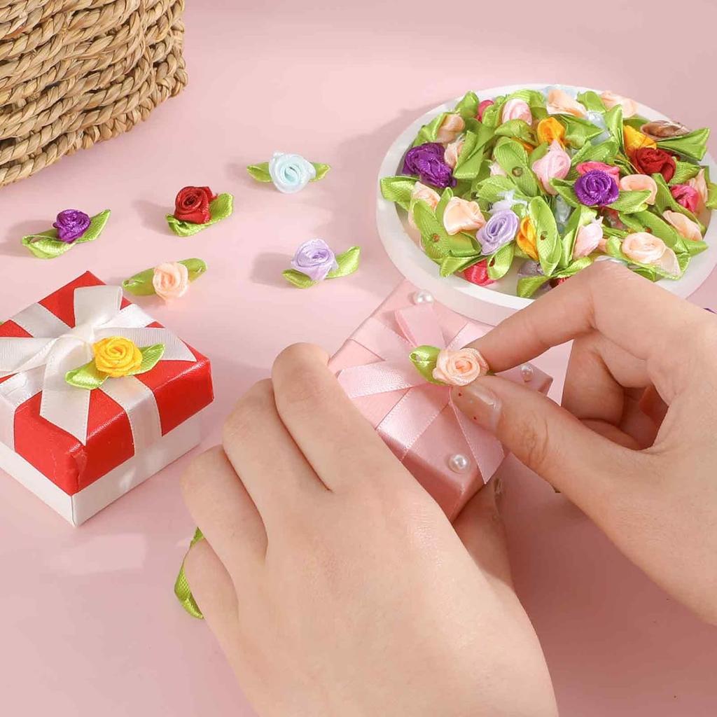 100 Pcs Mini Flowers for Crafts Multicolor Mini Roses Satin Roses with Green Leaves Small Satin Roses Tiny Artificial Fabric Flower Ornament Applique