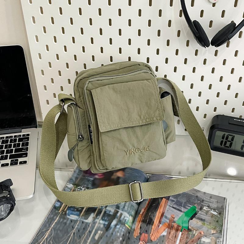 

Lightweight anti-splashing camera bag New trendy casual shoulder bag Outdoor travel messenger bag