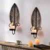 Black Candle Holder Wall Sconces With Leaf Detailing For Adding Warmth To Bedrooms And Living Space