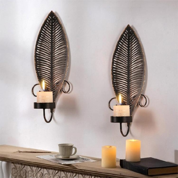 Black Candle Holder Wall Sconces With Leaf Detailing For Adding Warmth To Bedrooms And Living Space
