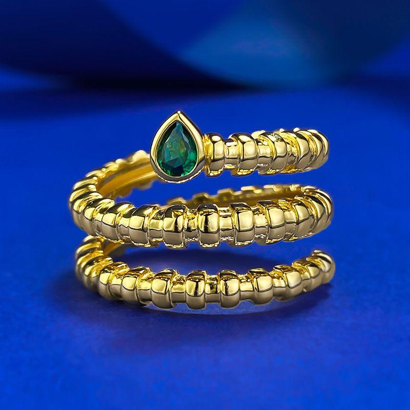 Xiancan Jewelry 2024 Women's S925 Silver Gold-Plated Snake-Shaped Ring with Simulated Emerald Cut.