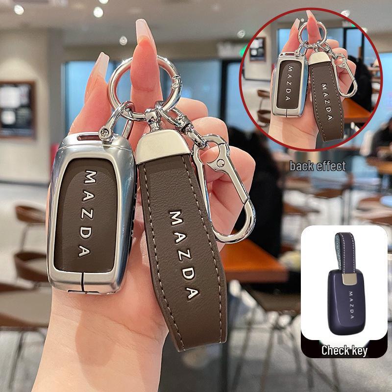 Kuooo: Wear-resistant, fully enclosed Mazda EZ6 key fob and EZ60 car remote protective cases with buckle.