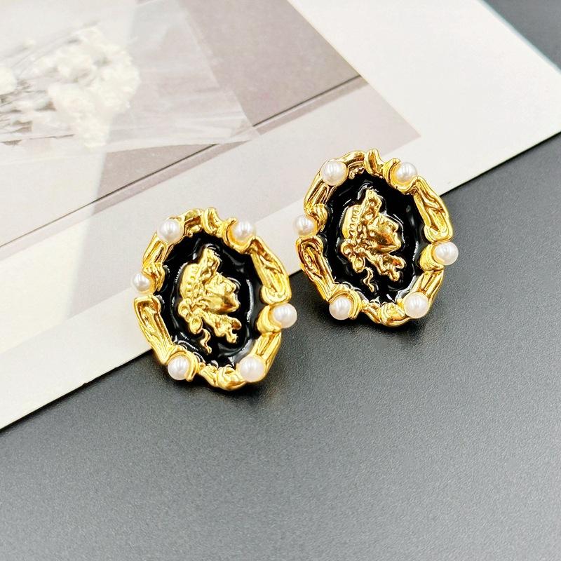 

French Retro Black And White Earrings Female Drop Glaze Portrait Stud Earrings Simple чорний