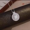 Diamond-Inlaid Rotating Compass Necklace - Elegant Light Luxury Clavicle Chain, New Chinese Style, Symbol of Good Luck for Women