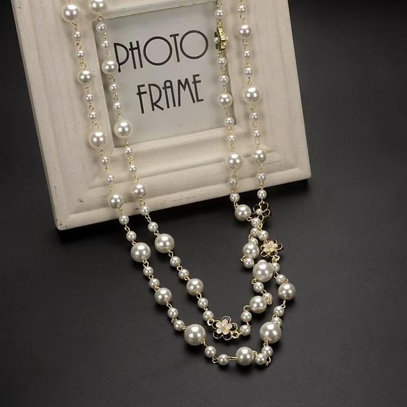 "2024 Light Luxury Pearl Necklace: Elegant Long Sweater Chain for Women, Perfect for Autumn & Winter"