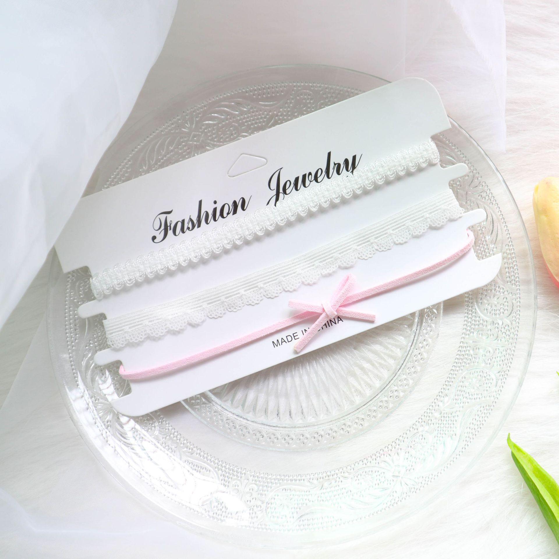 

Комплект чокеров из европейской и американской бижутерии: Короткое ожерелье-цепочка в виде свитера - коллекция из 3 предметов