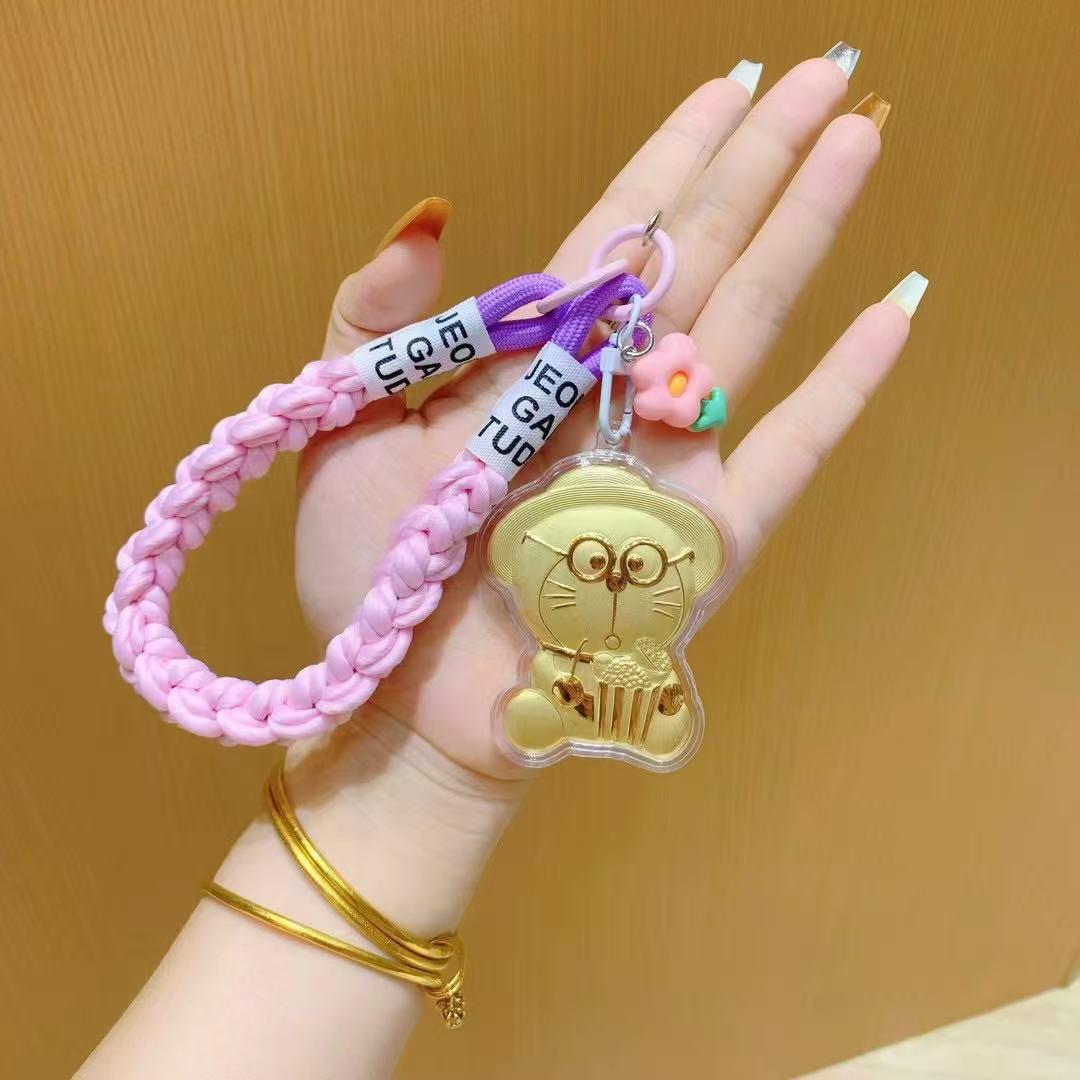 

Брелок из чистого золота 999 пробы «Дораэмон в соломенной шляпе» - Креативный мультяшный шарм для мобильных телефонов и сумок, Идеальный подарок для пар