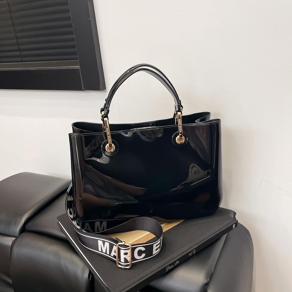 New fashion high-end sense solid color pvc commuter bag portable shoulder messenger temperament women's bag