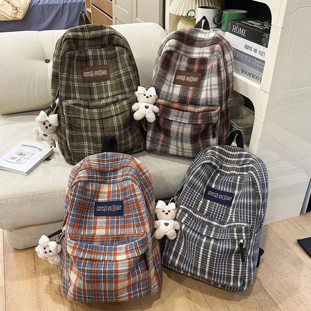 Schultasche Herbst und Winter neuer karierter Rucksack weiblich Koreanischer fauler Stil Pendlerrucksack Grund- und Sekundarschüler Rucksack mit großer Kapazität