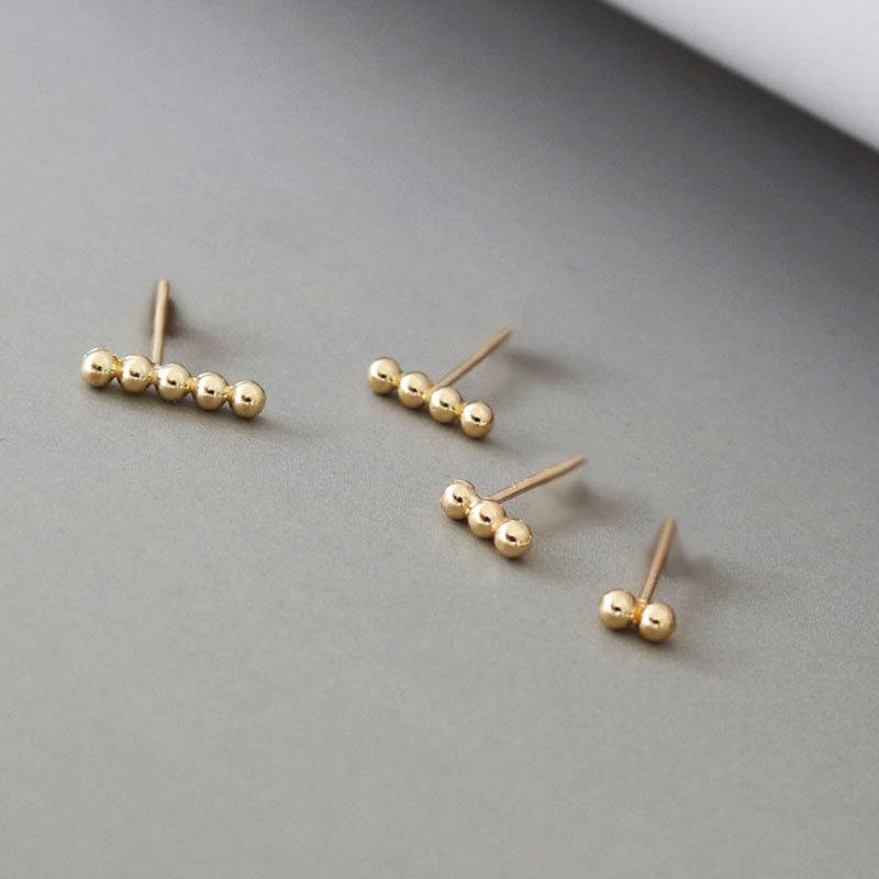 

Серьги из светлой бусины Серьги из бусины Серьги из бусины Простые маленькие свежие круглые серьги из бусины Cochlea Cold Style