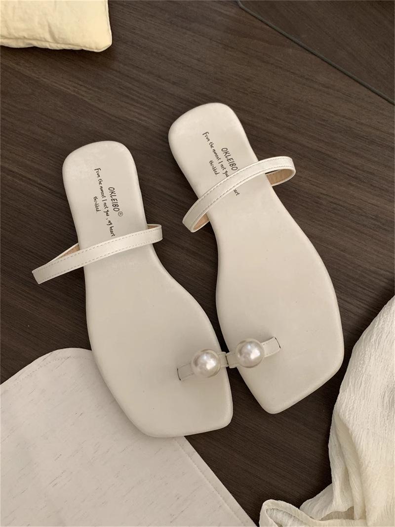 

Жемчужный темперамент модные летние низкий каблук квадратный носок шлепанцы женские французская плоская подошва новые крутые тапочки прилив 40