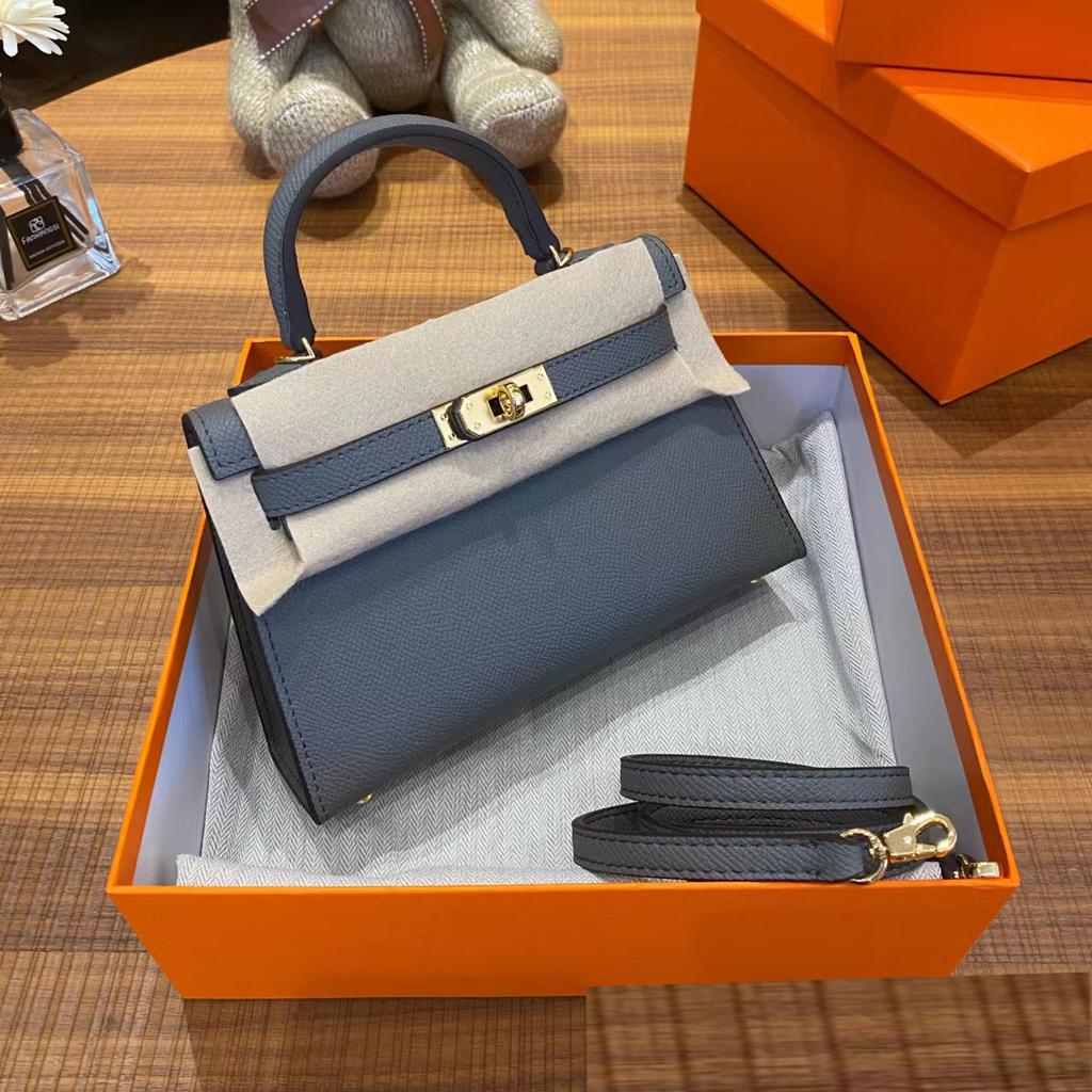 Grenzüberschreitende Hersteller Großhandel Damenhandtaschen 2023 neue Handtaschen aus Leder mit Palmenmuster tragbare Schulter-Umhängetaschen Damenhandtaschen große Kapazität