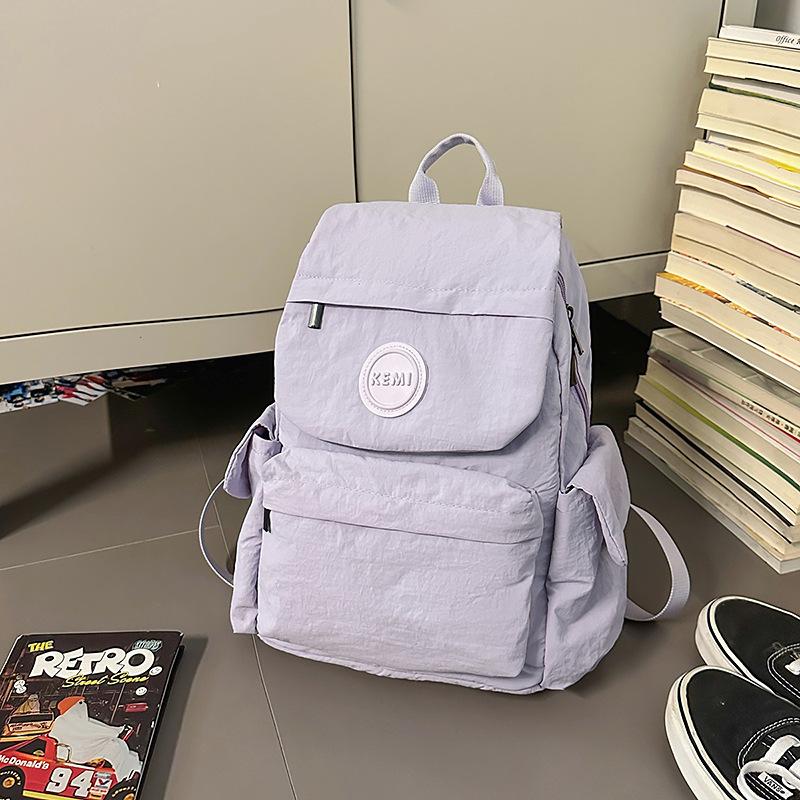 New Japanese outdoor lightweight fashion schoolbag backpack small backpack women's simple and versatile new travel schoolbag women