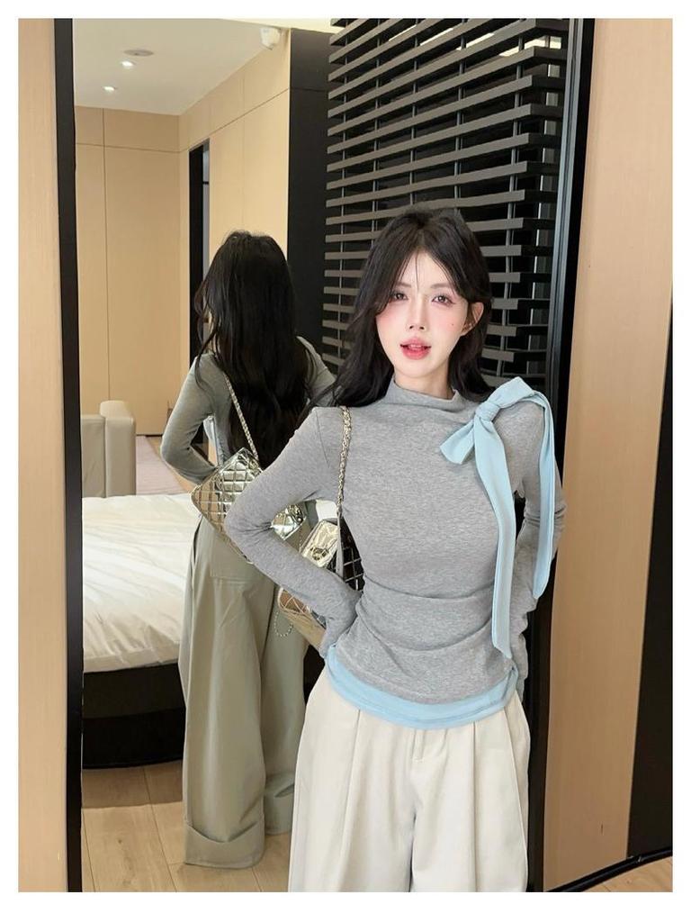 Elegante Top de Punto para Mujer con Cuello Alto y Lazo