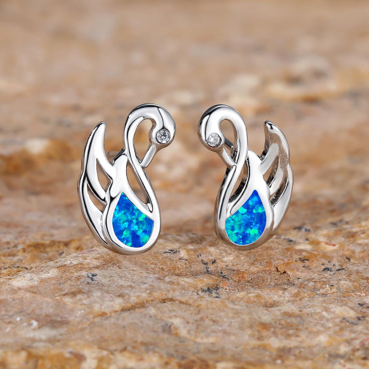 Модные серьги-лебеди с кристаллами циркона — фото 10