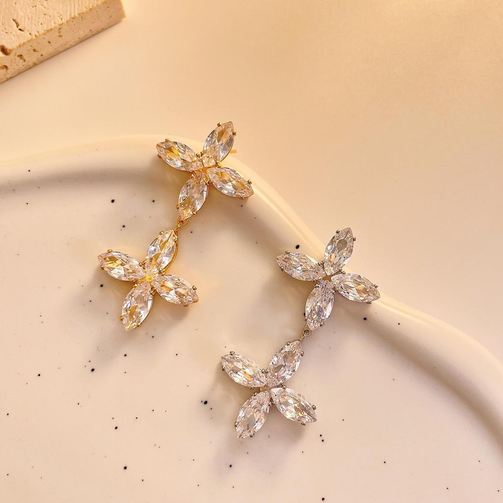 Light Luxury Double Cross Four-Leaf Clover Zircon Earrings in Gold-Plated Copper.