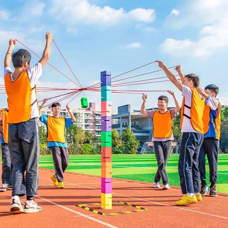 Stavění věže společně Rozšiřování školicích týmů Hry založené na spolupráci Architektura ve stylu věže Hračky pro venkovní sporty Hry Párty