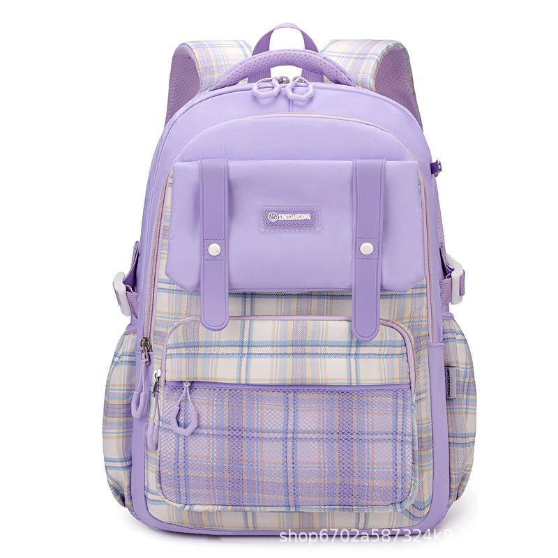 New schoolbag for primary school students, plaid load-reducing ridge backpack, anti-splashing water and wear-resistant canvas backpack, fashionable.