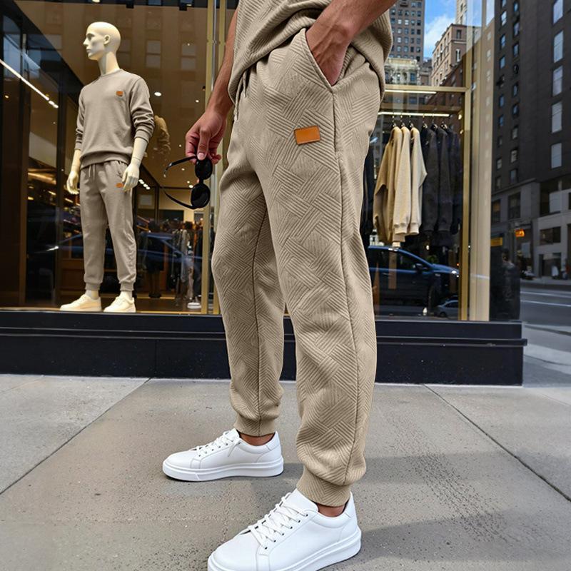 Men's Loose and Simple Casual Sports Commuting Sweatpants with the Same Texture Pattern at the Counter