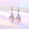 Silver-Plated Moonlight Cat's Eye Earrings: Exquisite Dangle and Stud Designs for Women
