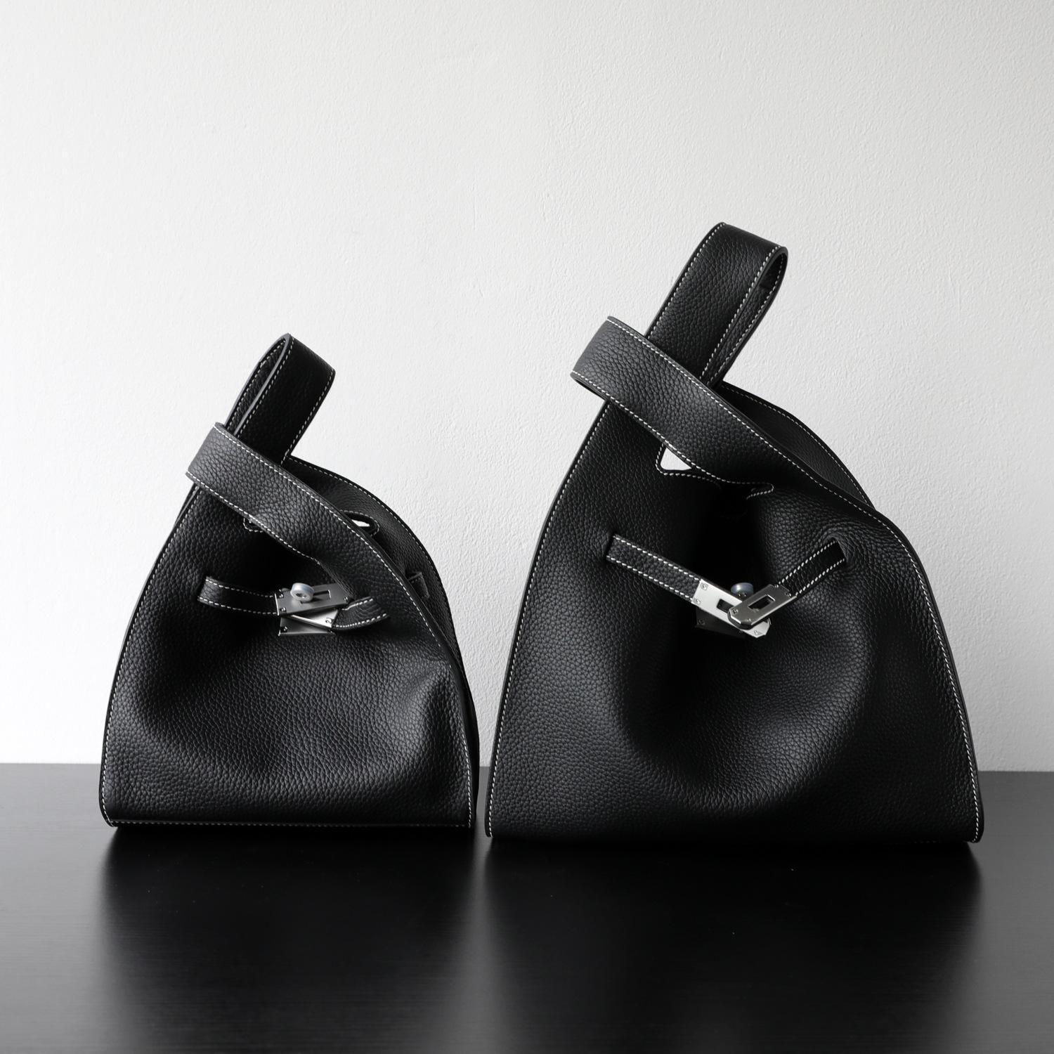 

Niche light luxury simple relaxation wax thread first layer cowhide daily commuter vest vegetable basket bag single shoulder crossbody woman Small чорний