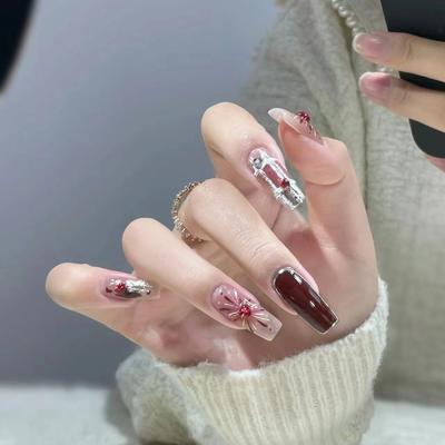 Manucure du Nouvel An Pièces d'ongles pures à porter à la main Fait main Doux et cool Hot girl Plâtre Plâtre Rouge Feux d'artifice Peut être retiré