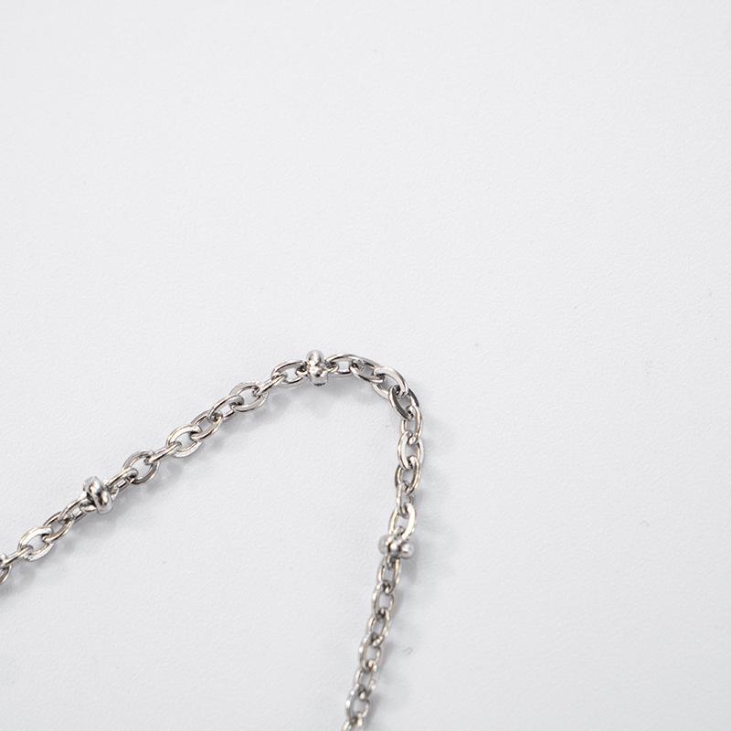 European & American Women's Sequin Chain Spaghetti Strap Open-Back Swing Neck Top