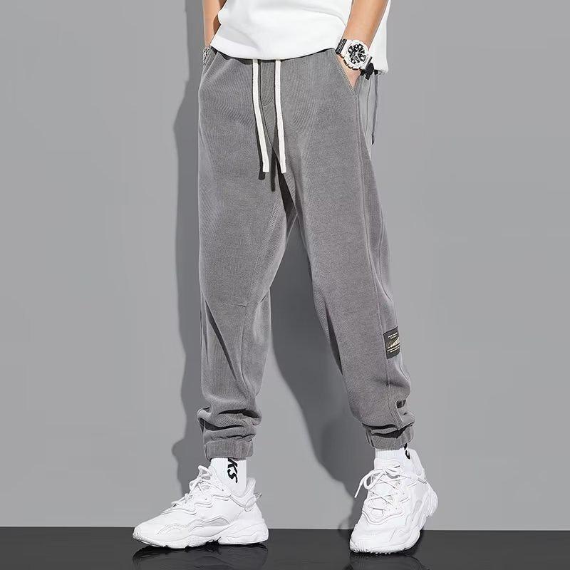 Men's Thickened Fleece-Lined Casual Pants, Drawstring Ankles, Loose Fit, Trendy Autumn/Winter 2023 Style.