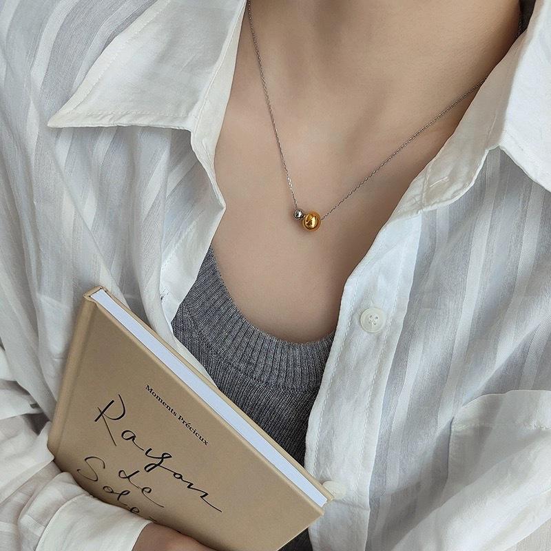 Elegant Two-Tone Gold & Silver Bead Necklace with Rotating Clavicle Design, Titanium Steel, 18K Gold-Plated, Fade-Resistant