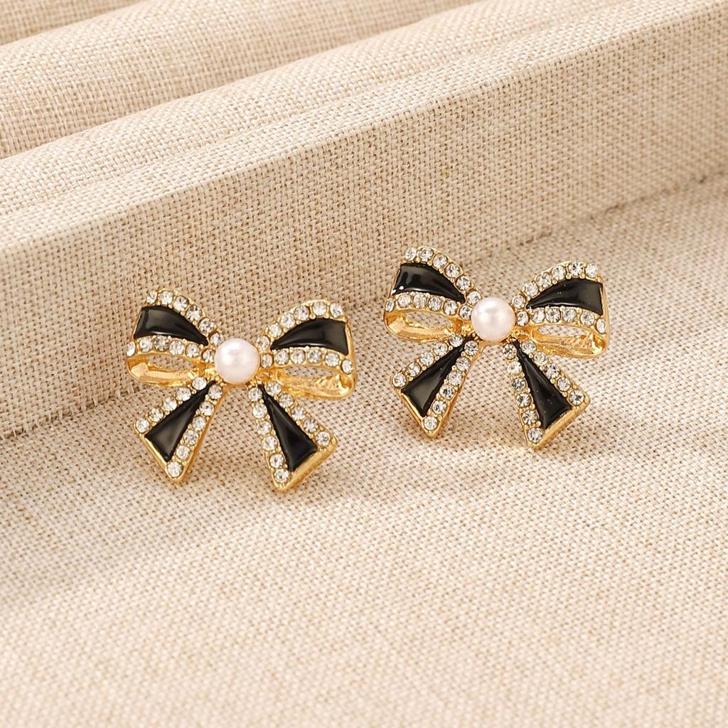 Christmas Bowknot Shaped Studs Earrings Alloy Dripping Oil Ear Rings for Women Girls Elegant Party Wear Ear Accessories