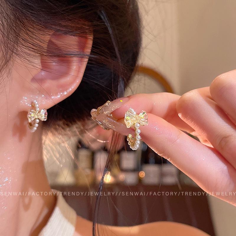 2025 Trendy Korean Micro-Inlaid Zircon Bow Earrings with S925 Silver Needle and Pearl for Women