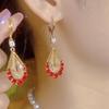 Elegant Gold Mesh Teardrop Earrings with Brown Crystals - Women's Luxury Fashion