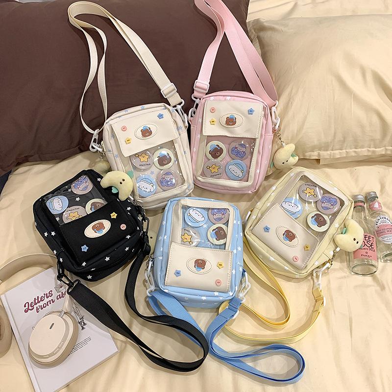 Japanese ins casual girl small bag, versatile messenger bag, cute transparent and painful bag, grain bag, mobile phone bag.
