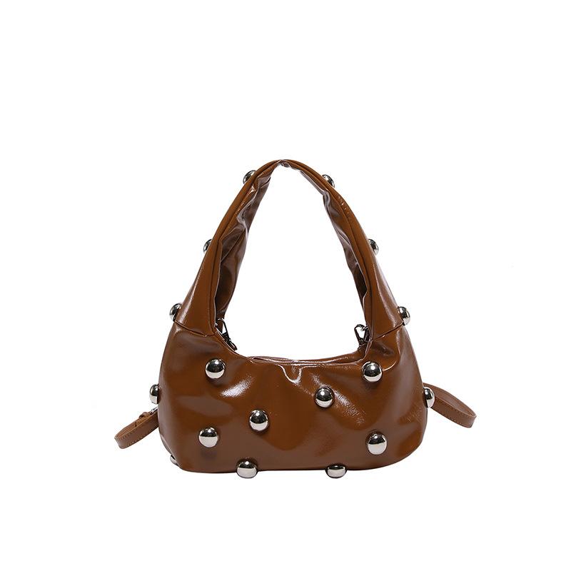 2025 New Women's Bag Korean Version Fashion Rivet Personality Fashion Niche Shoulder Bag Ins Internet Celebrity Crossbody Armpit Bag