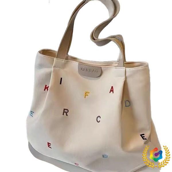 Trendige Damen-Canvas-Tasche 2025 mit gestickten Buchstaben – Geräumige Umhängetasche für Studenten