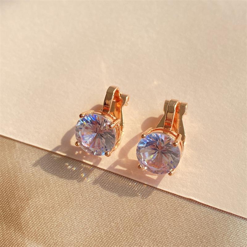 

Элегантные круглые серьги с цирконием: Простые и универсальные клипсы для женщин