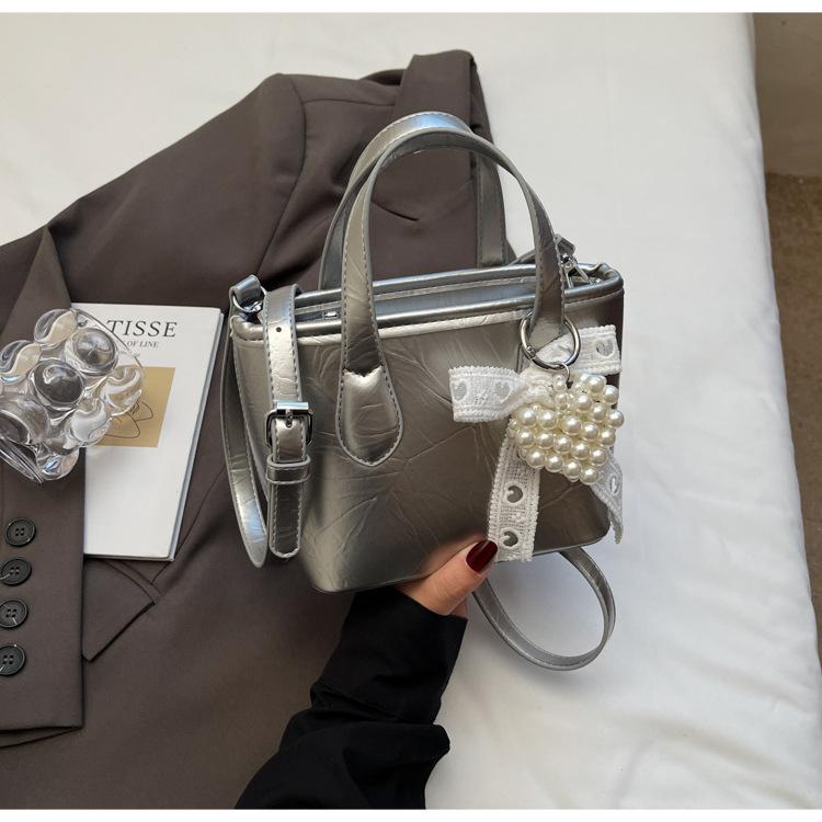 

Портативная модная сумка высокого класса женская 2025 новая простая сумка-ведро нишевый дизайн универсальная повседневная сумка-мессенджер